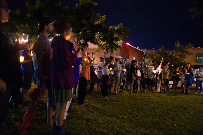 Scores withstand storm in solidarity with counterprotesters